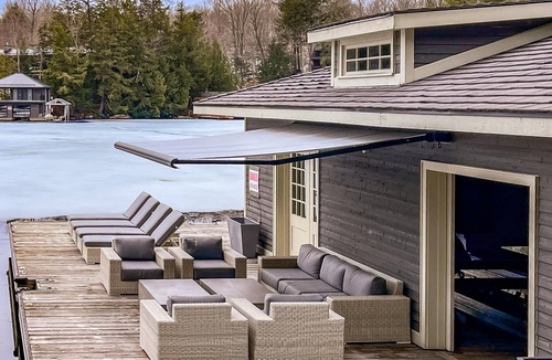 Muskoka Lakes Cottage | Stunning Cottage on Lake Joe! 6 bdrm,6 bath,2 slip boathouse! Water Toys Galore!