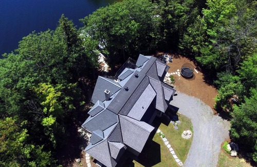 Muskoka Lakes Cottage | Stunning Cottage on Lake Joe! 6 bdrm,6 bath,2 slip boathouse! Water Toys Galore!