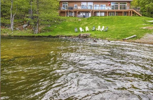 Rideau Lakes House | Stunning waterfront home nestled in a private bay on Opinicon Lake, pet friendly