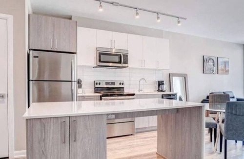 Hintonburg Apartment | Stylish Studio Escape near Suya Palace with Terrace