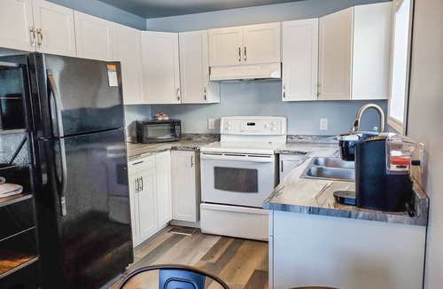 Timmins Apartment | Sunflower Retreat - Private 2 Bedroom, 1 Bath