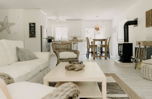 Bayfield Cottage | The Sugar Shack family retreat w arcade & hot tub. Walk to Main St. and Beach
