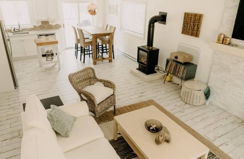 Bayfield Cottage | The Sugar Shack family retreat w arcade & hot tub. Walk to Main St. and Beach