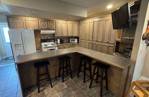 Bridgeview Apartment | Three Bedroom Three Bath Penthouse with Sauna & Exercise/Office Space