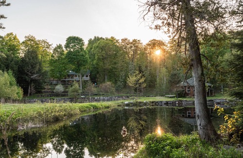 Bobcaygeon Ski Chalet | Tranquil Oasis in Trent Lakes w/Private Ponds, Fire Pit, Game Room & Hot Tub