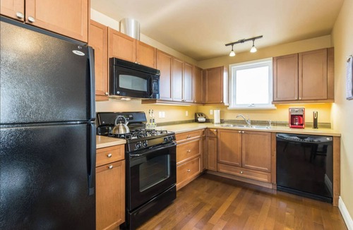 Point Edward Condo | Unique spacious upper Condo Suite. Steps from waterfront