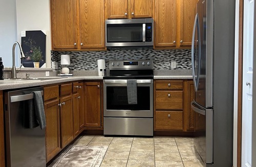 Blaine House | Unwind in style at our Cozy-lakefront townhome retreat. Conveniently located.