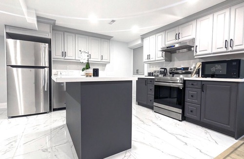 Clarington Apartment | Urban Haven: 2BR/2BA+Office, Kitchen, Dining