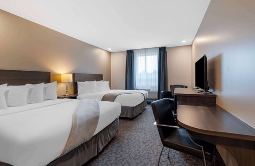 Hearst Hotel | Villa Inn & Suites, SureStay Collection by Best Western