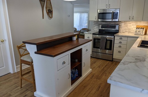 Bracebridge Cottage | Vintage Boho River-Front Cottage in Muskoka