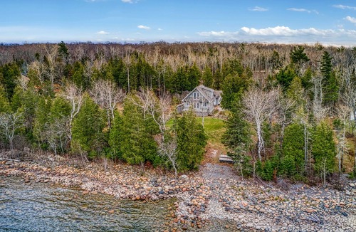 Manitoulin District House | Waterfront, chalet style home; minutes walk to the beach