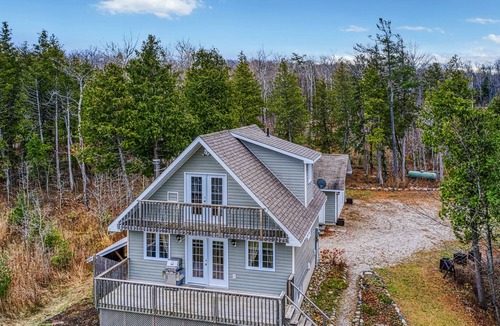 Manitoulin District House | Waterfront, chalet style home; minutes walk to the beach