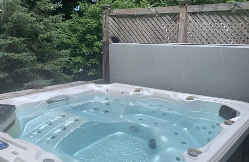 Eagle Lake Cottage | Waterfront Family Retreat w/Sauna, Hot tub, Fire Pit, Sandy Beach, Deep off Dock