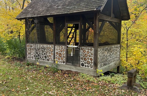 Plymouth House | Wooded lot with wildlife, indoor treehouse and screened porch: a family paradise
