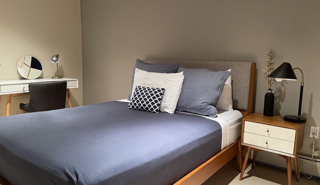 B&B with 2 rooms, a guest washroom, private media room, shared living & kitchen.
