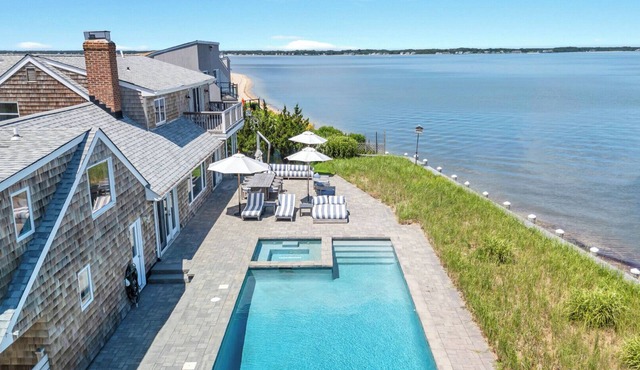 Bayfront Luxury Retreat with Heated Pool, Private Beach, and Sweeping Water.