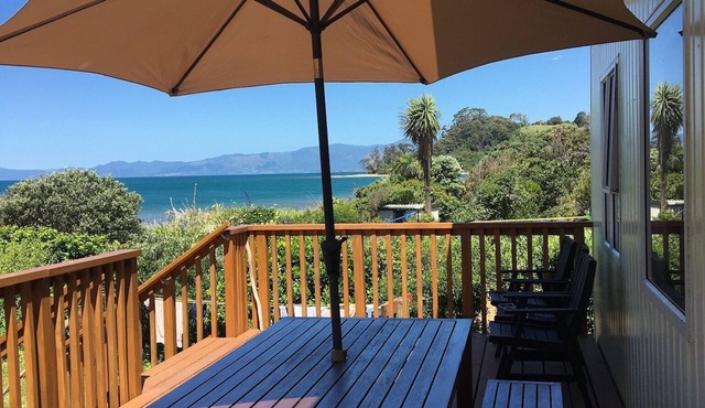 Beachfront bach - your slice of paradise.