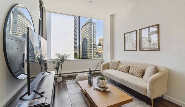 Bright Downtown 1BR, Balcony, City Views & Parking