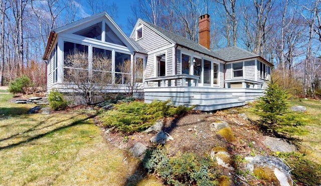 Oceanfront retreat with sunrise views, screened porch, & deck