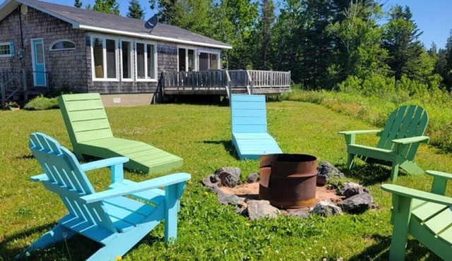 One-minute walk to a sandy beach. Beachside Haven Cottage awaits.