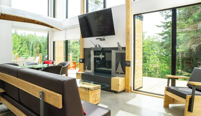Relaxing Escape w/Fireplace, BBQ & Serene Du Loup River Backdrop