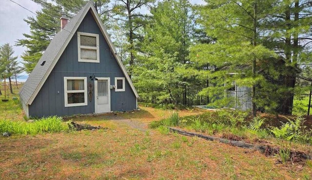 Rustic A-Frame Retreat on Grand Traverse Bay w/beach, wifi, fire pit & grill