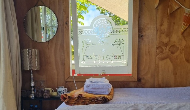 Unique, delightful Tiny Home with Alfresco living area including retro Poptop.