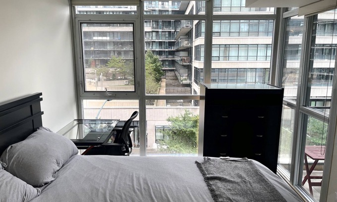 Toronto Entertainment District Condo | 2BD 1 Bath 4 Guests Parking Balcony Near CN Tower Downtown—By Hostia