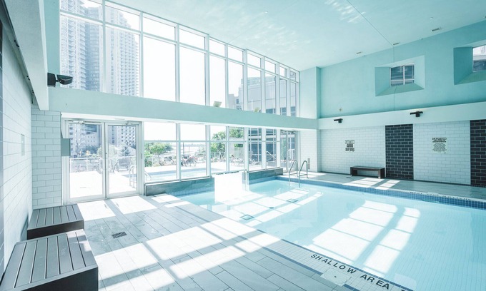 Fashion District Apartment | RivetStays - The Adelaide Suites