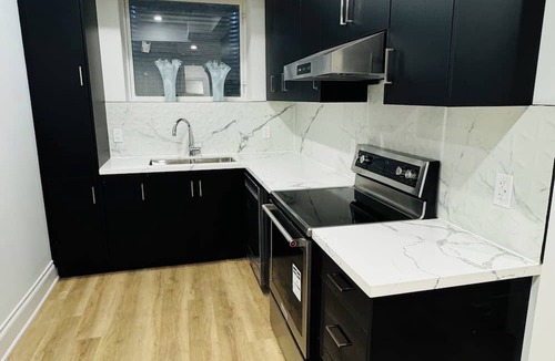 Caledon House | Experience modern luxury and comfort in our charming two bedroom apartment!