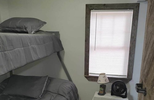 Chisago City Cabin | 40 Min from the cities, 4 ft from the shore! Sandy beach. Fish off the dock!
